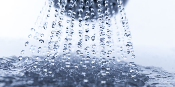 Shower head and water drops.